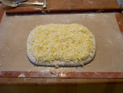 half the dough, half the cheesed
